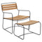 Conjunto de sillón bajo con reposabrazos y reposapiés de teca SURPRISING de la marca francesa Fermob. Comprar Fermob online. Rincón del Mueble