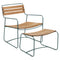 Conjunto de sillón bajo con reposabrazos y reposapiés de teca SURPRISING de la marca francesa Fermob. Comprar Fermob online. Rincón del Mueble