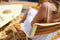 Sillón bajo con reposabrazos de teca SURPRISING de la marca francesa Fermob. Comprar Fermob online. Rincón del Mueble
